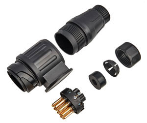 Exploded view of a 13-pin trailer socket (female) showing external body and internal copper pin assembly