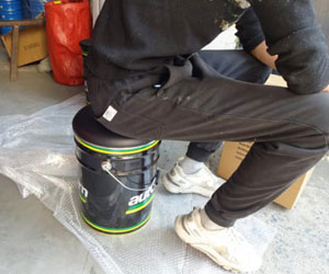 Tiroflx sourcing agent performing quality control on Picnic seat bucket in China