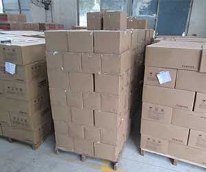 Pallets of finished OEM car air compressor kits ready for consolidation and shipment.